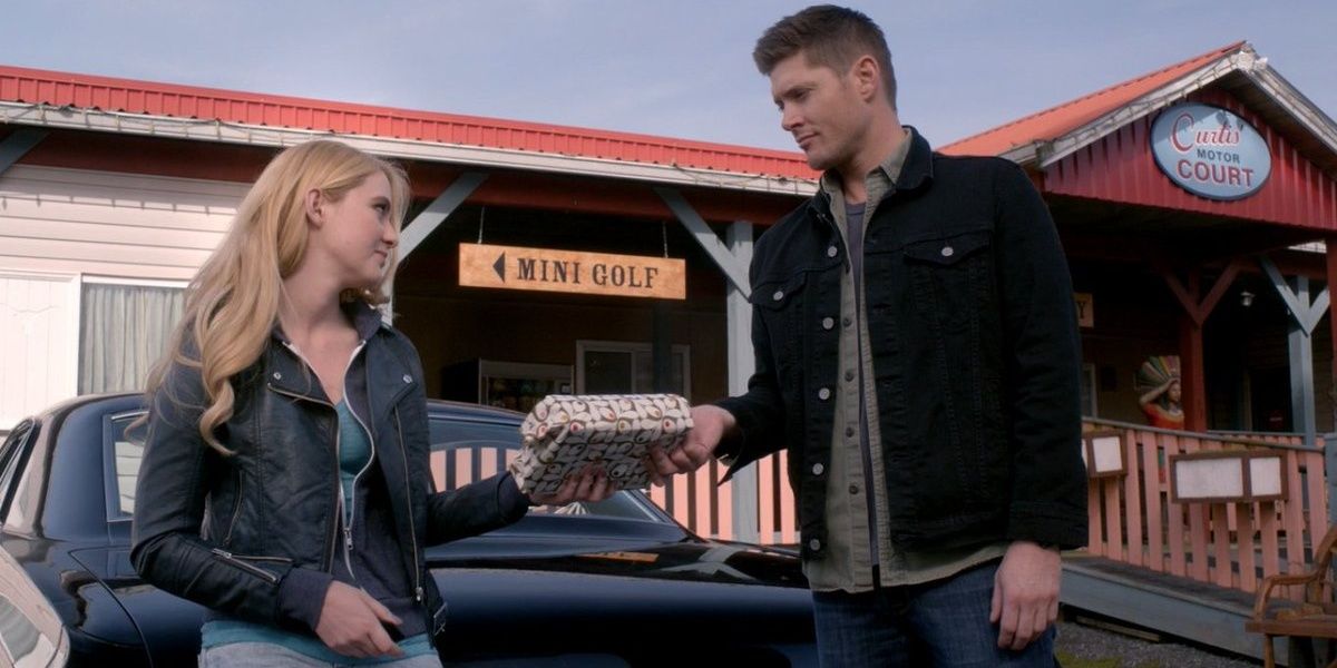 Dean ives Claire a copy of Caddyshak in Supernatural