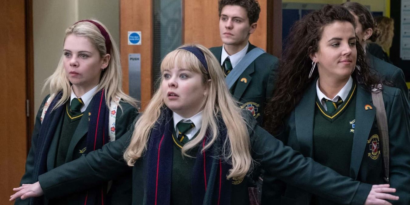 Clare stands in front of Erin, James, Michelle, and Orla in Derry Girls