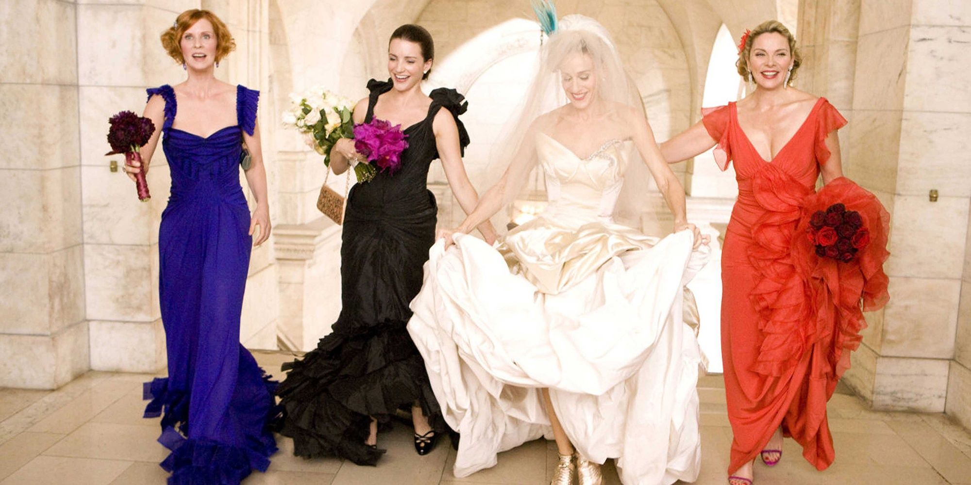 Carrie and her friends dressed up for Carrie's wedding in the first Sex and the City movie