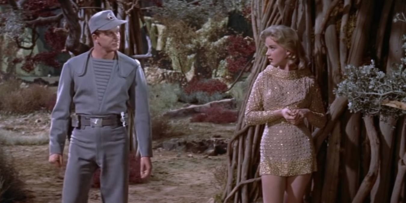 A man and woman talk in Forbidden Planet 1956