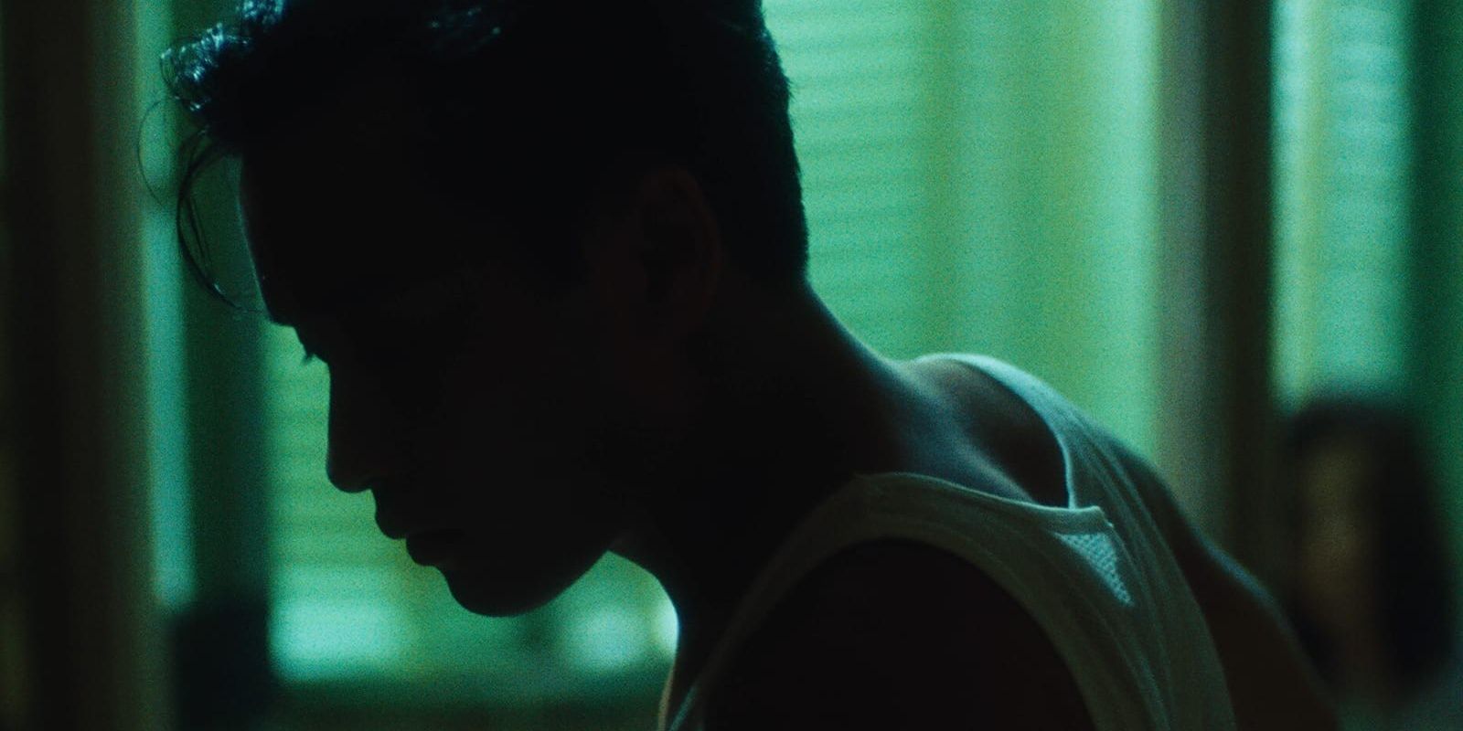 Leslie Cheung in a dark room in Days of Being Wild