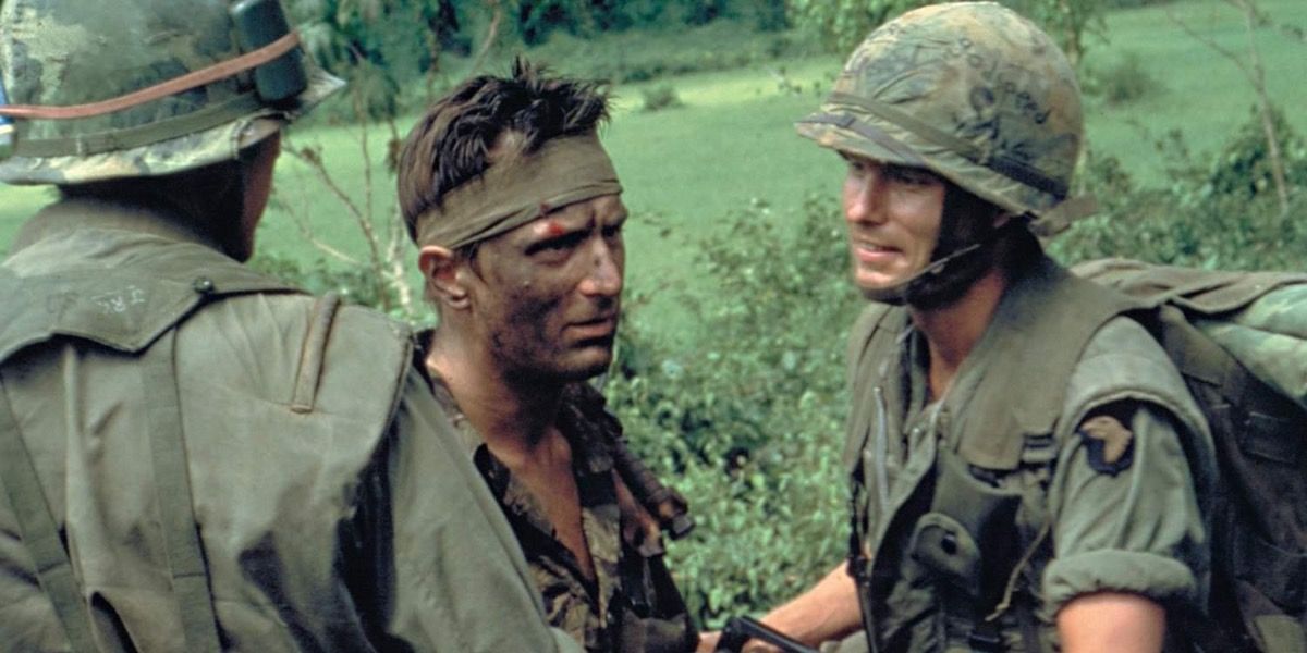 Robert De Niro in the Deer Hunter dressed in military fatigues in the Vietnam war