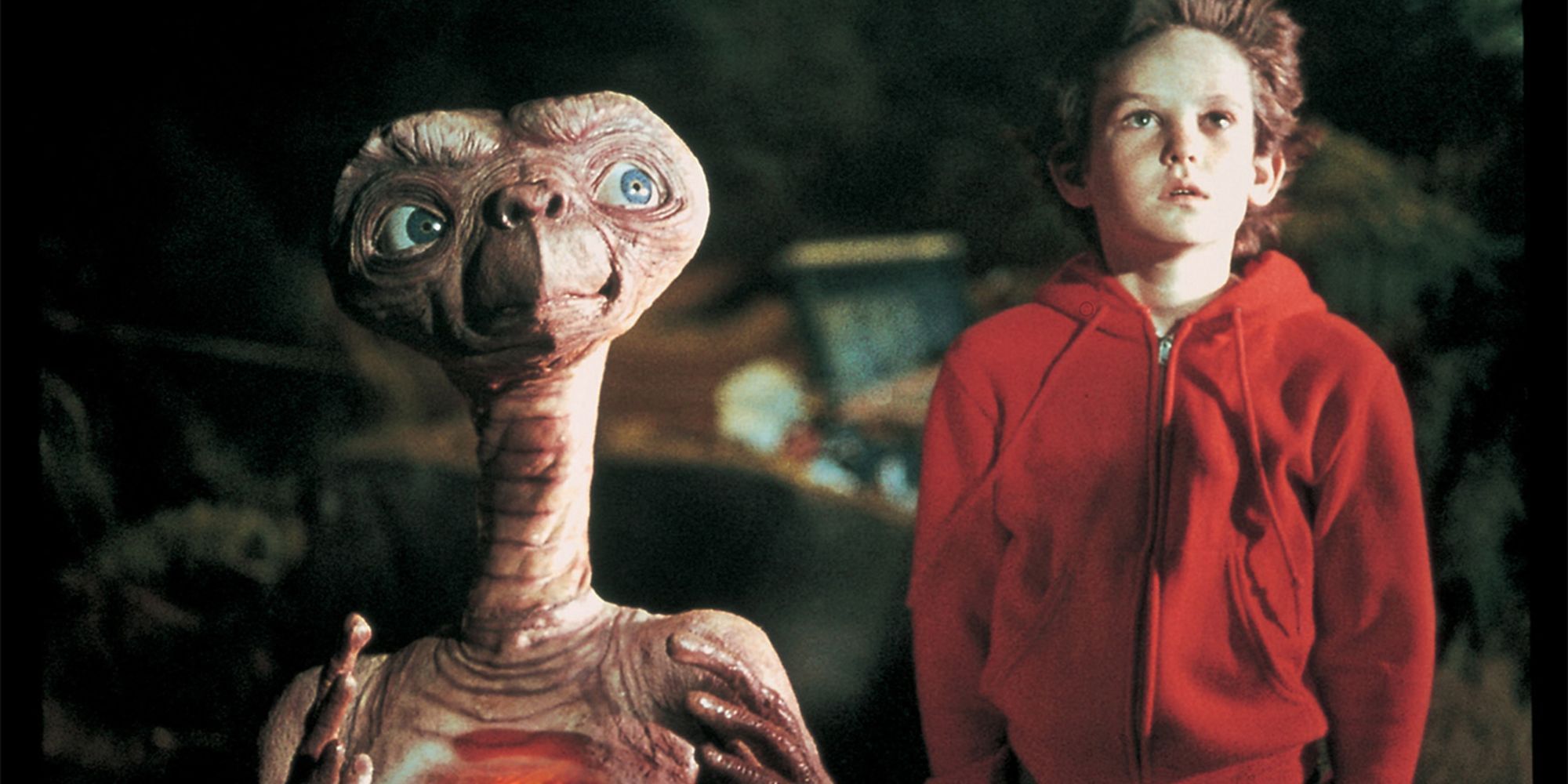 E.T. and Elliott standing together