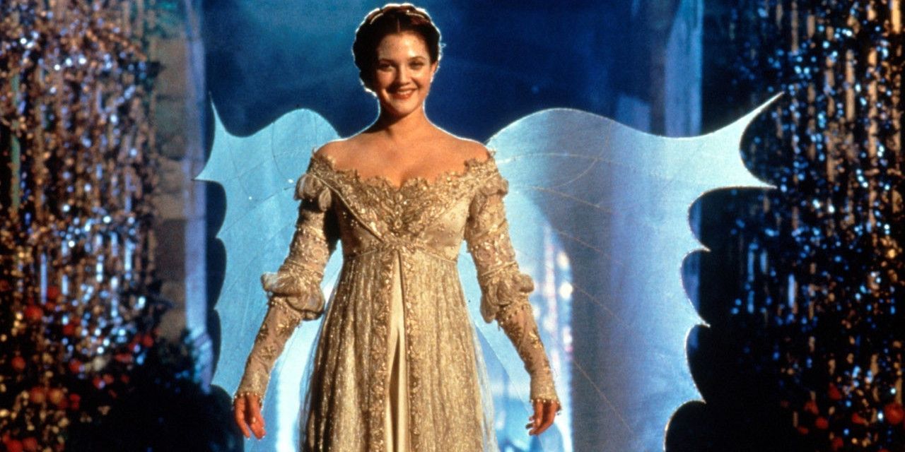 Drew Barrymore standing and smiling in Ever After