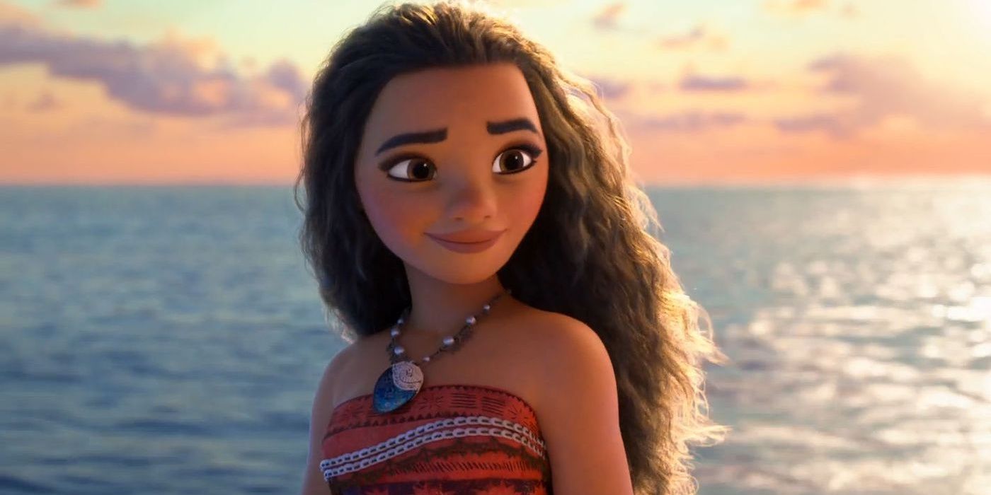 Moana looks back with the sea in the background