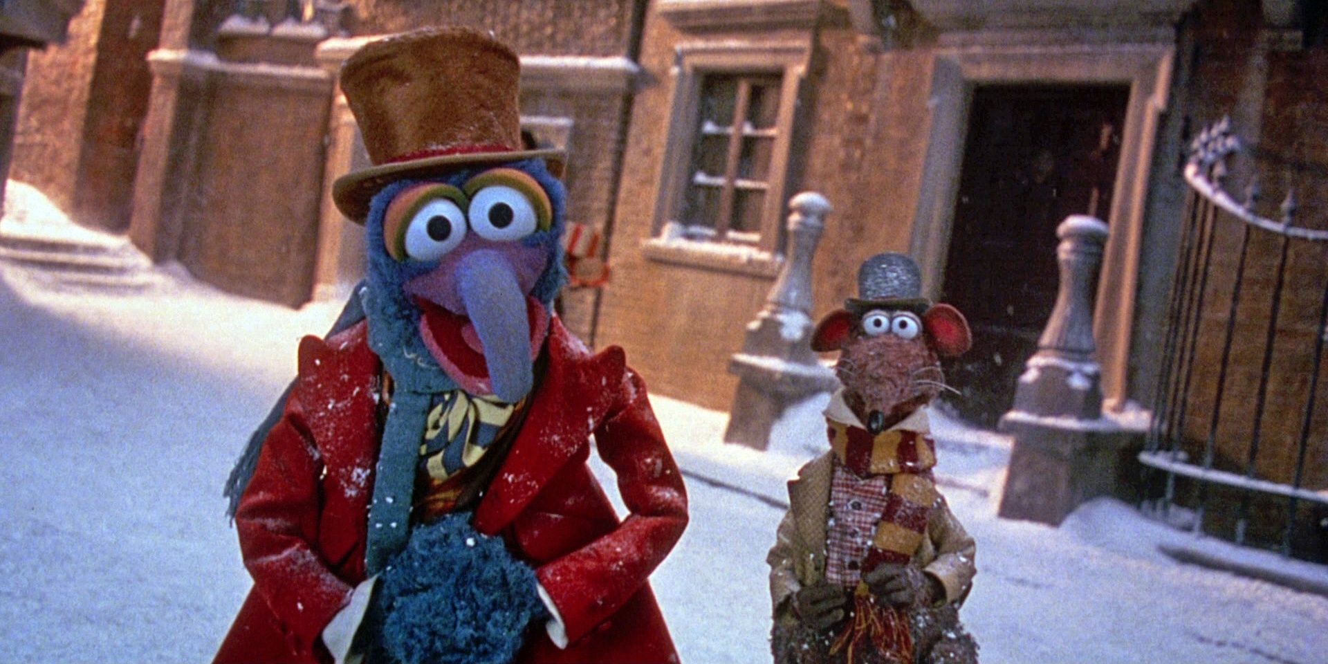 Gonzo and Rizzo walk on a snow-covered street in The Muppet Christmas Carol