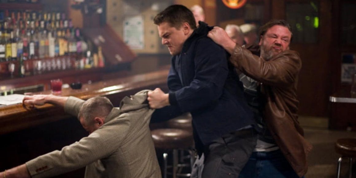 Billy fights two men in a bar in The Departed