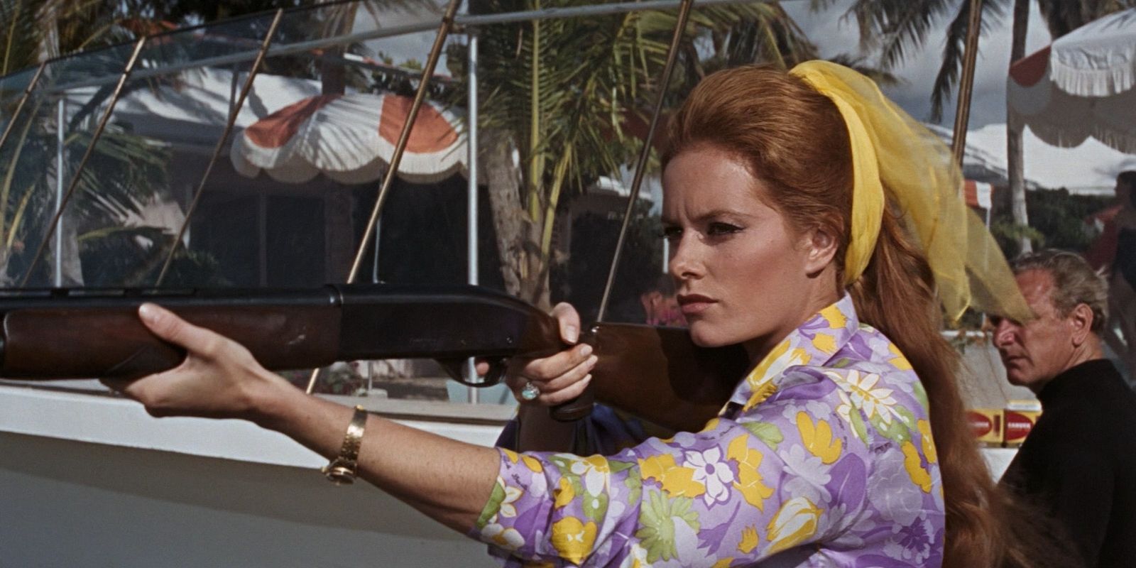 Fiona Volpe using a shotgun in Thunderball