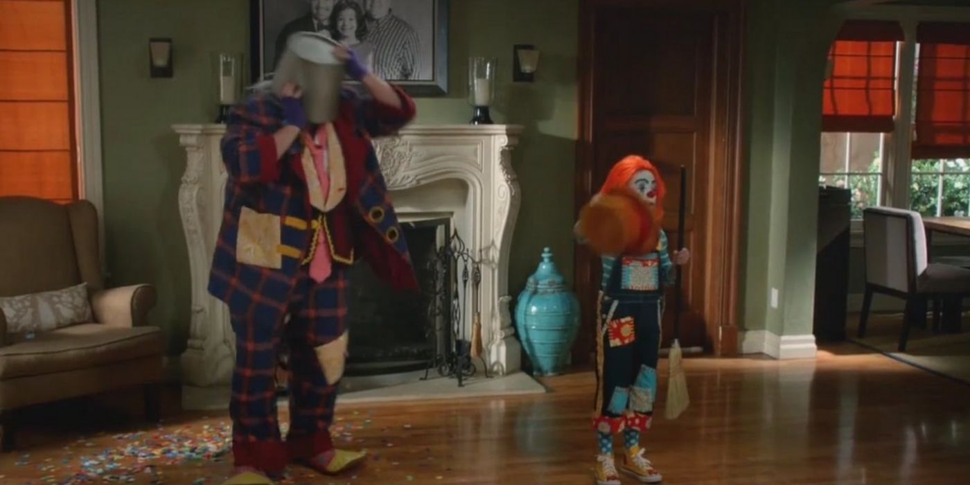Fizbo and Lily being a clown in Modern Family