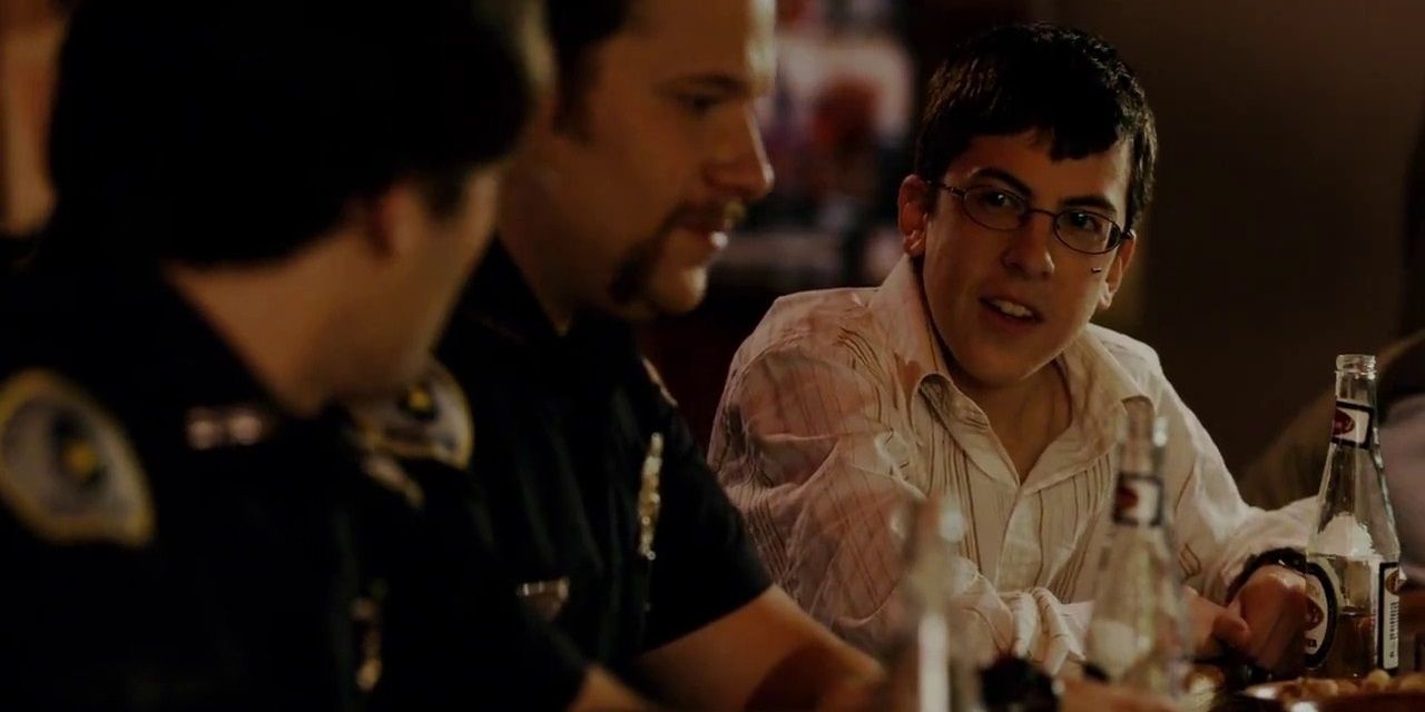 Fogell drinking with Officers Michael and Slater in Superbad