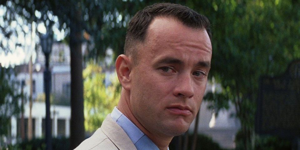 A close-up shot of Forrest Gump looking to the side. 