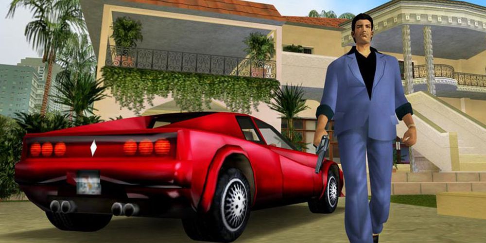 Tommy Vercetti outside an apartment complex next to a red car in GTA