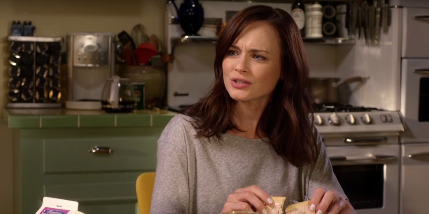 Rory sitting in kitchen of Lorelai's house on Gilmore Girls: A Year In The Life