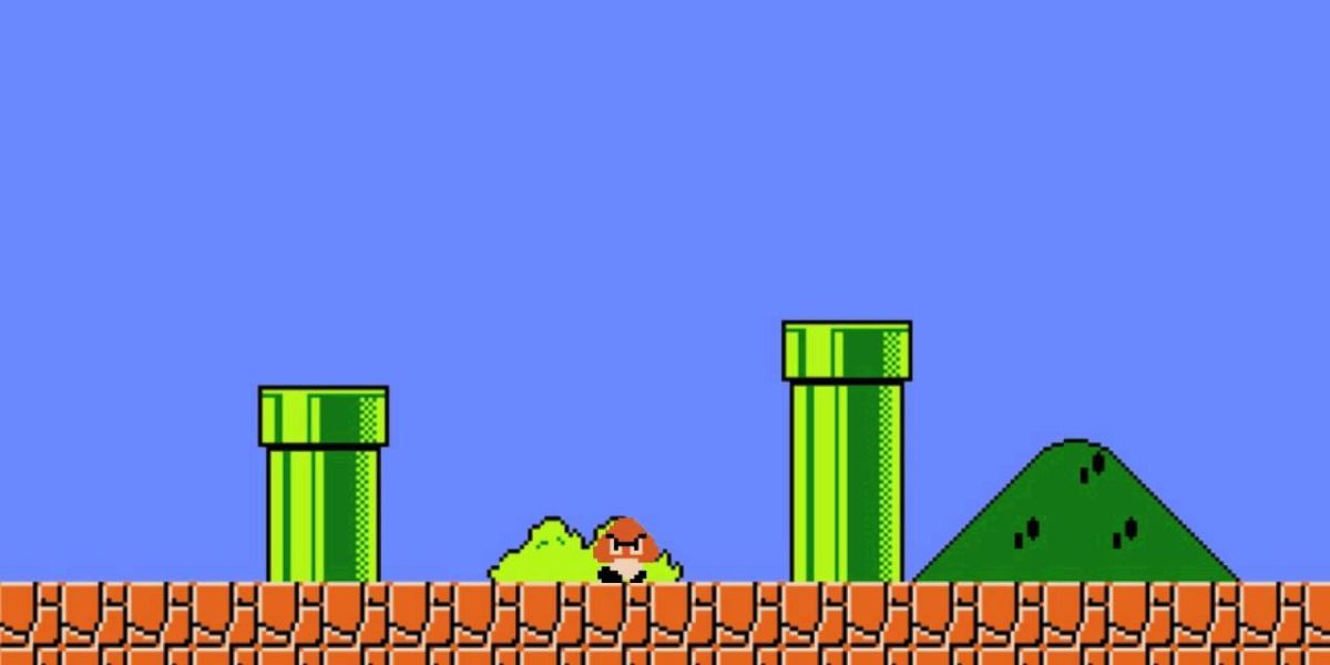 A Goomba trapped between two pipes in the first Mario game.