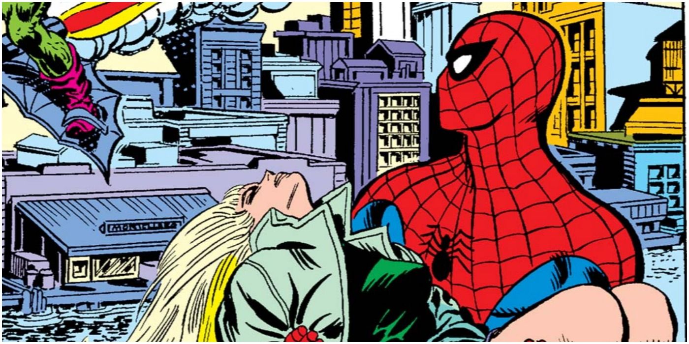 Spider-Man carries the limp body of Gwen Stacy in Marvel Comics.