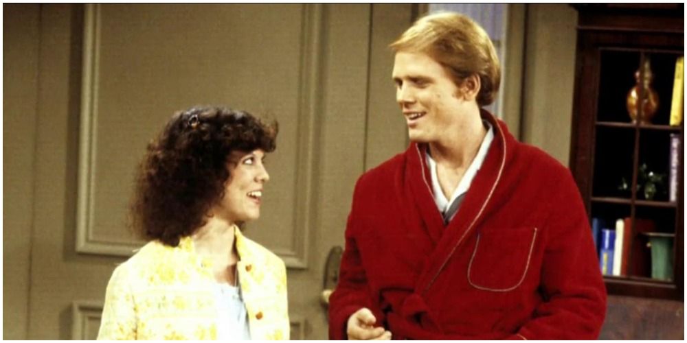 Richie and Joanie Cunningham from Happy Days - Joanie in yellow shirt and Richie in red bathrobe