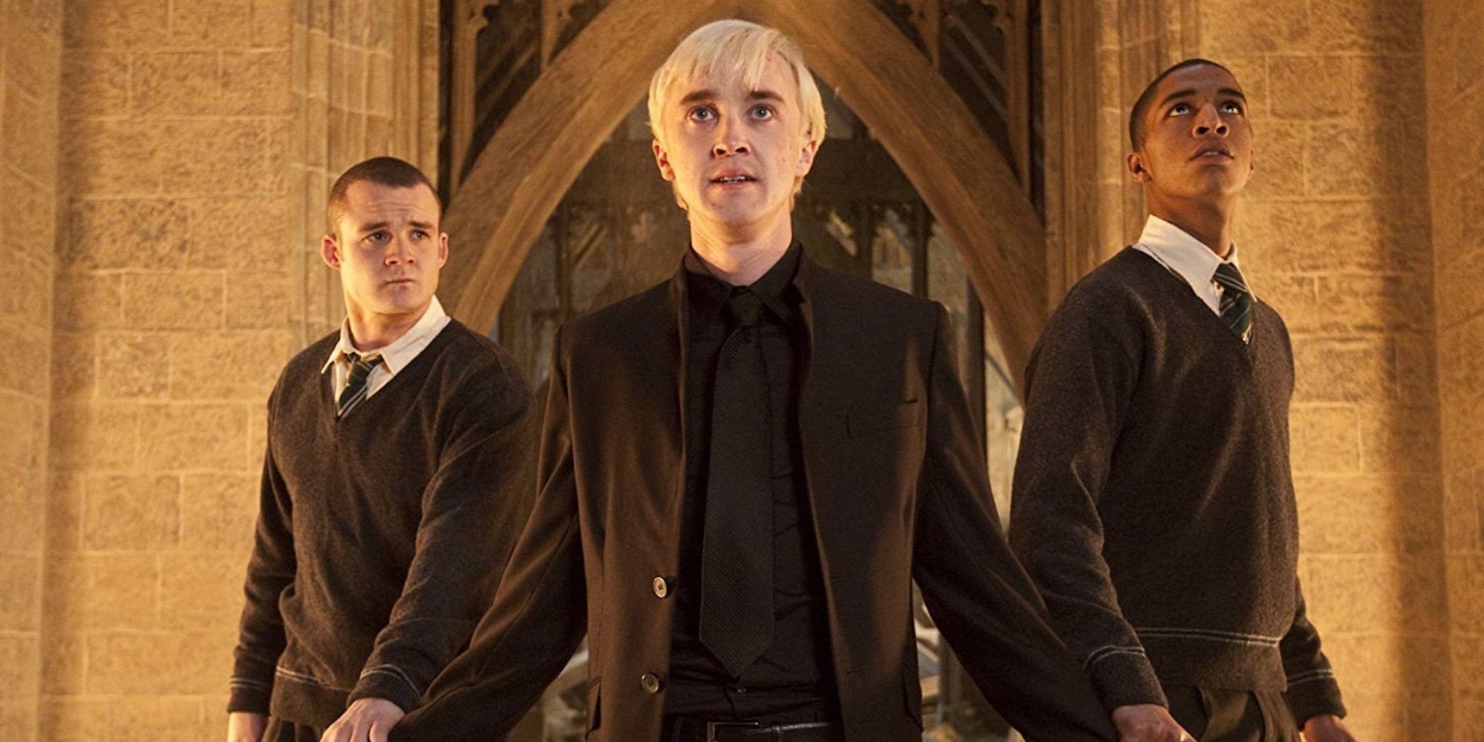 Malfoy stands with Zabini and Goyle