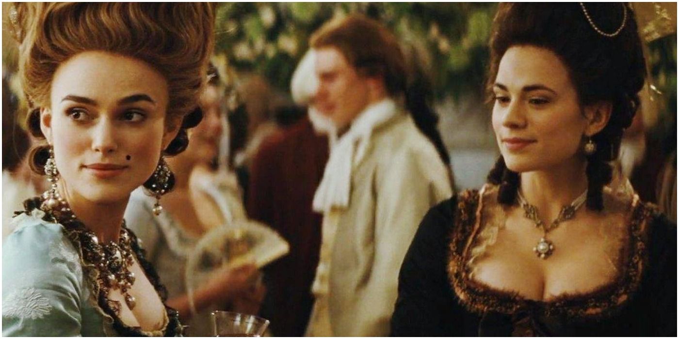 Lady Elizabeth Foster stares at Georgiana Cavendish, who looks over her shoulder