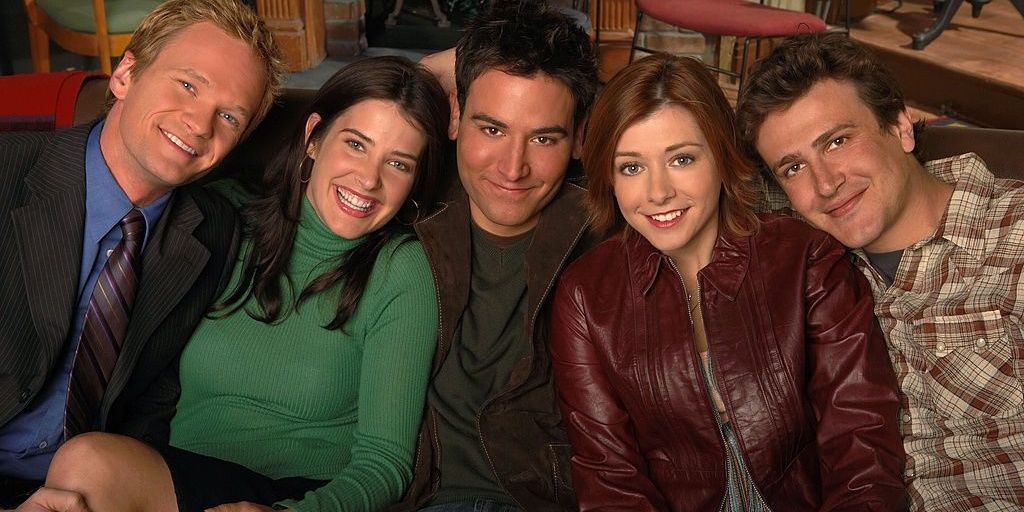 Barney, Robin, Ted, Lily, and Marshall all smiling together on HIMYM.