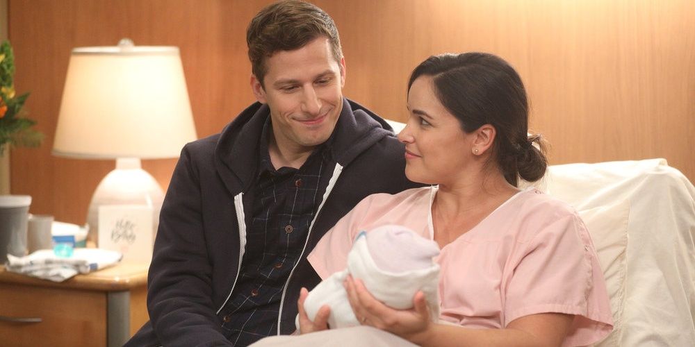 Jake and Amy with their newborn baby
