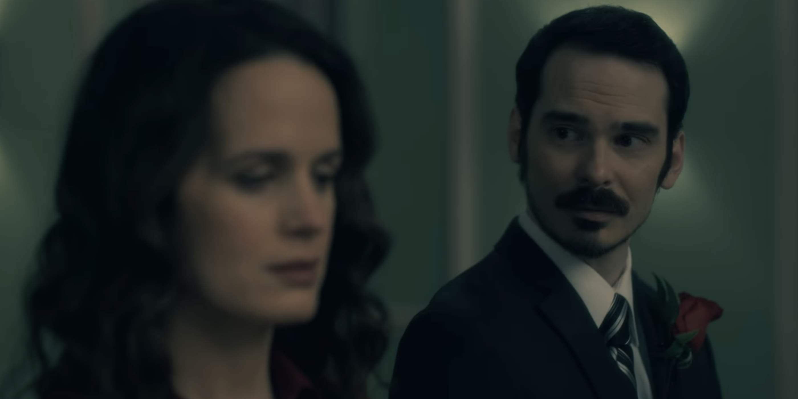 Kevin looks surprised at his wife Shirley in in Haunting of Hill House.