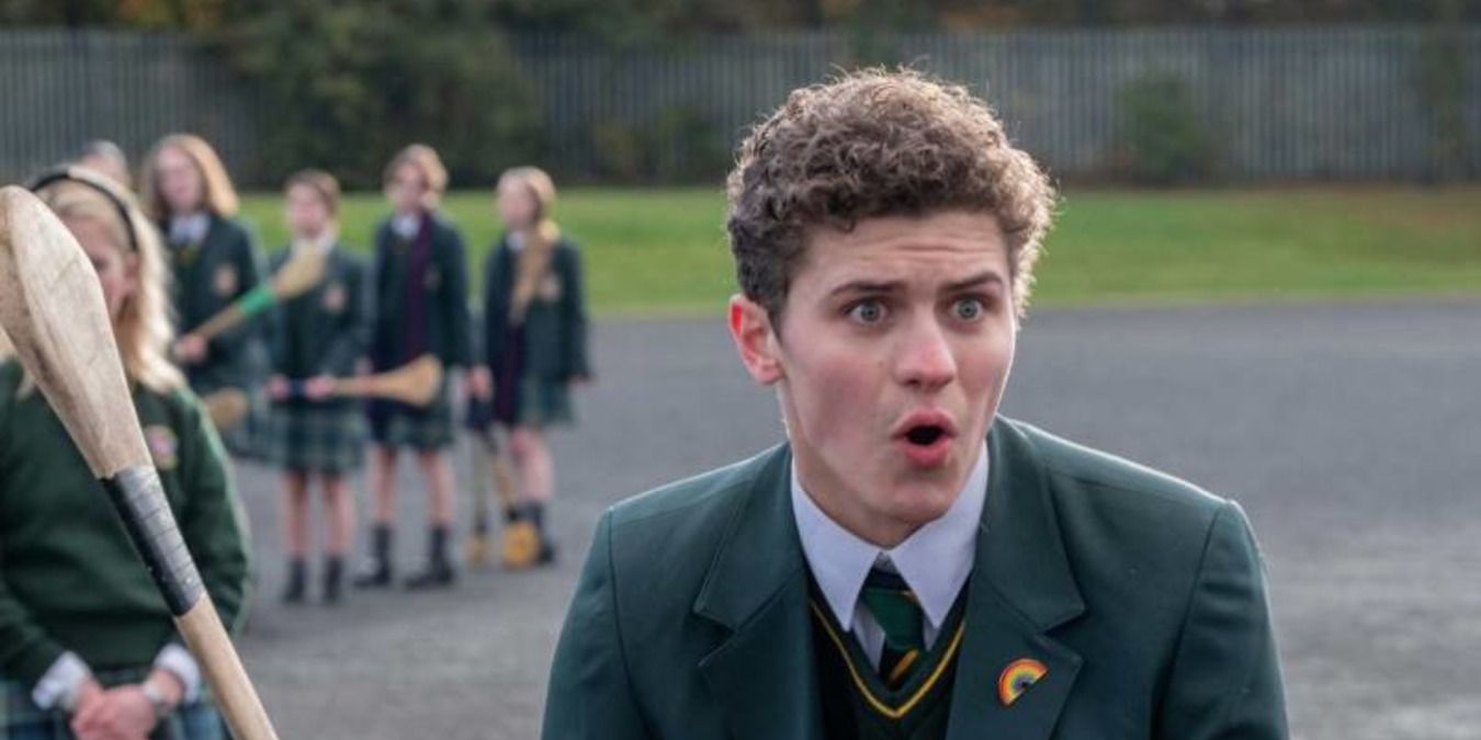 James yelling while holding a cricket bat in Derry Girls