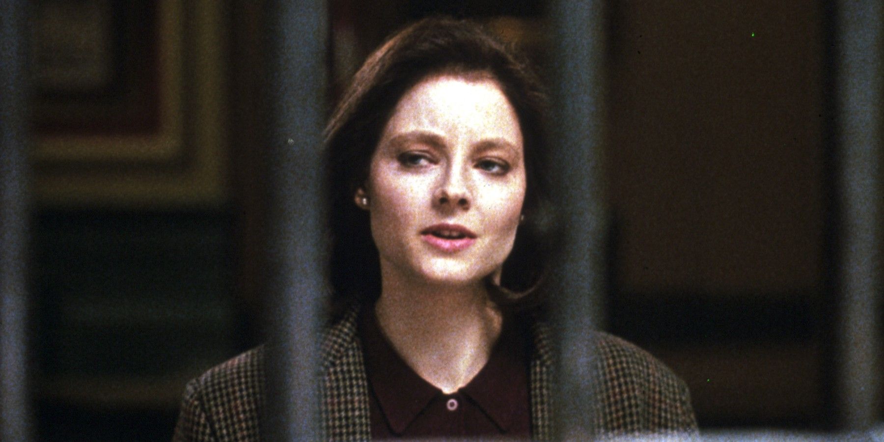 Agent Clarice Starling peaks to the serial killer Hannibal in The Silence of the Lambs
