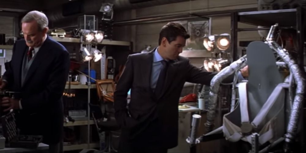 John Cleese as Q and Pierce Brosnan as James Bond checking out the old relics in die another day
