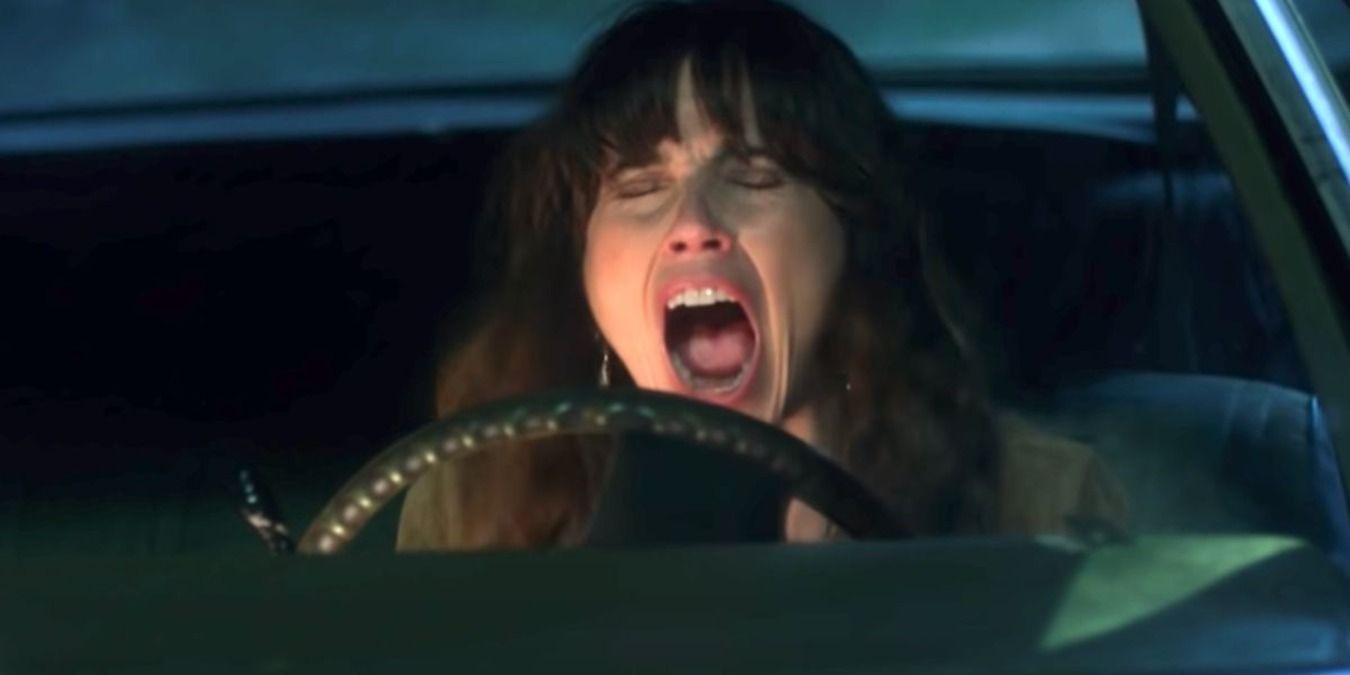Dead to Me's Judy screaming behind the steering wheel of car