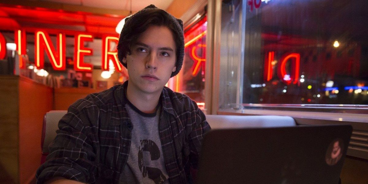 Riverdale's Jughead using his laptop at Pop's Diner