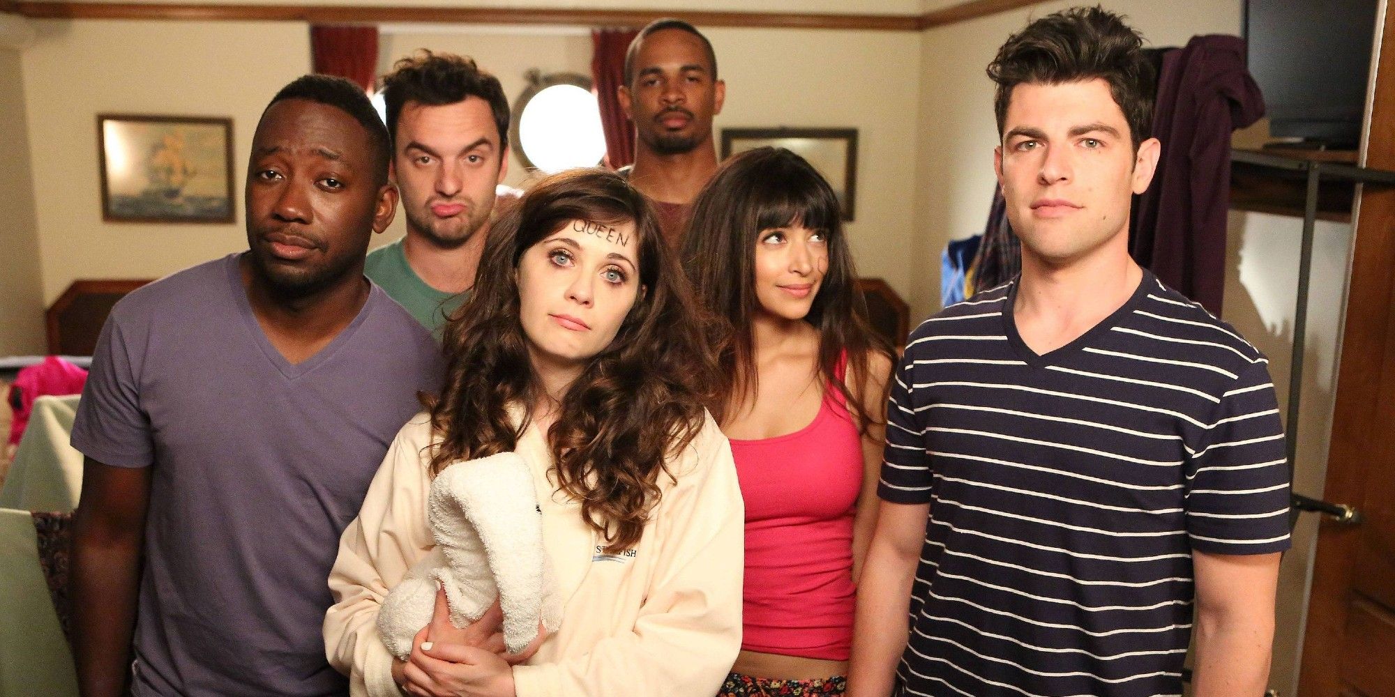 The New Girl cast stands in the doorway of their cabin in the season three finale Cruise after having been locked in for several days