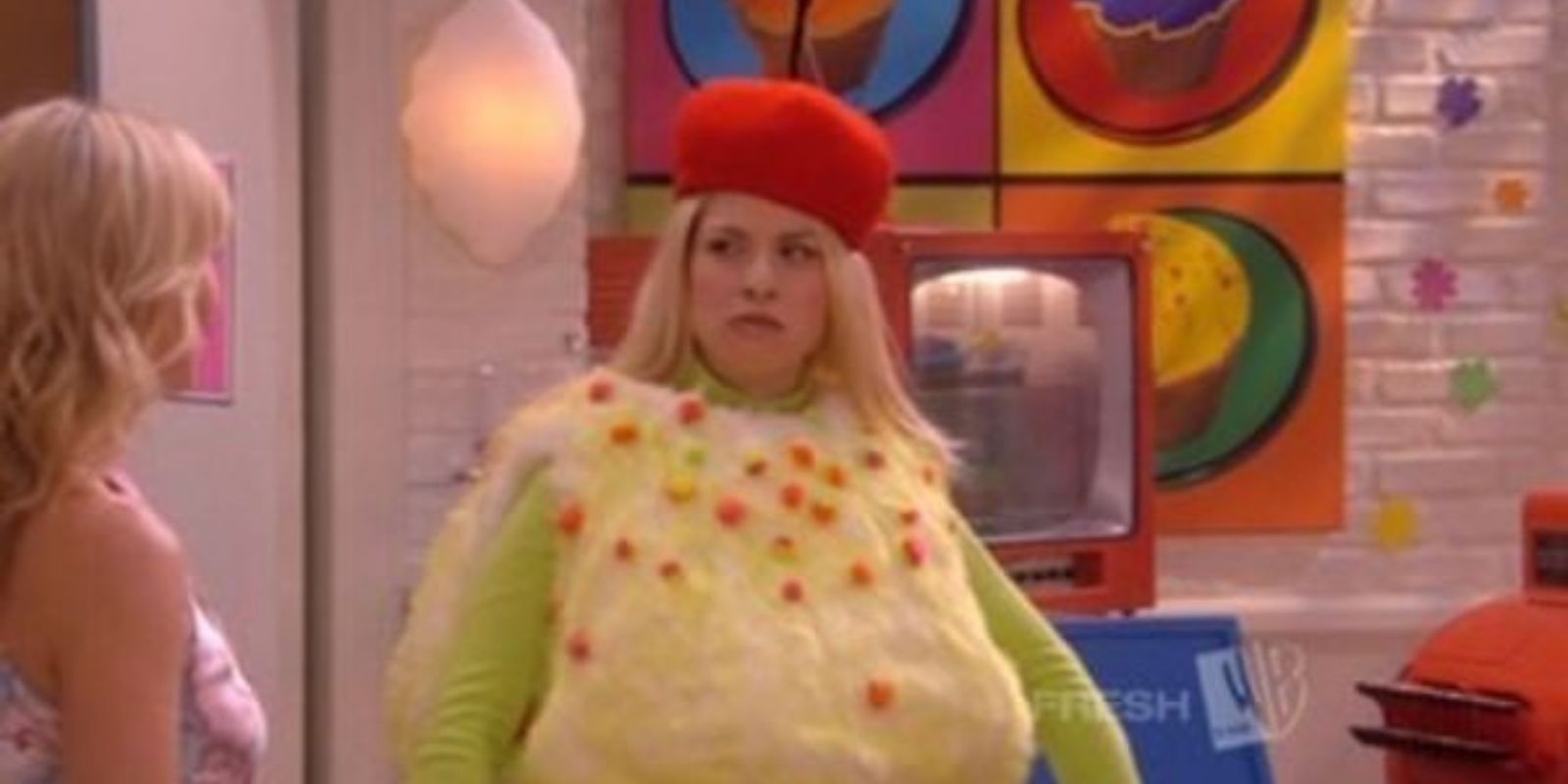 Lauren dressed as a cupcake to promote the bakery in What I Like About You