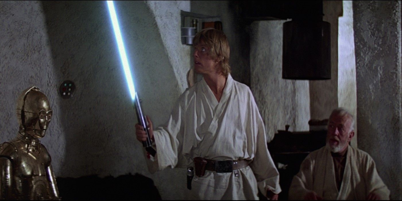 Luke ignites his father's lightsaber in Star Wars