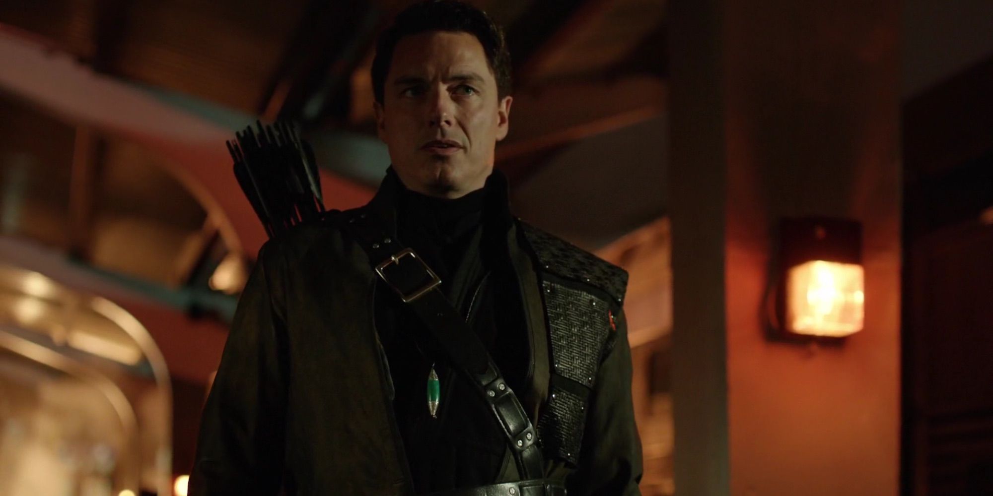 Malcom Merlyn suited up in his Dark Archer gear on Arrow 