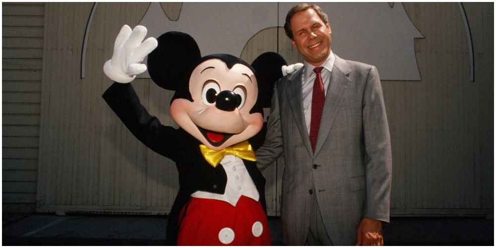 Michael Eisner seen with Mickey Mouse