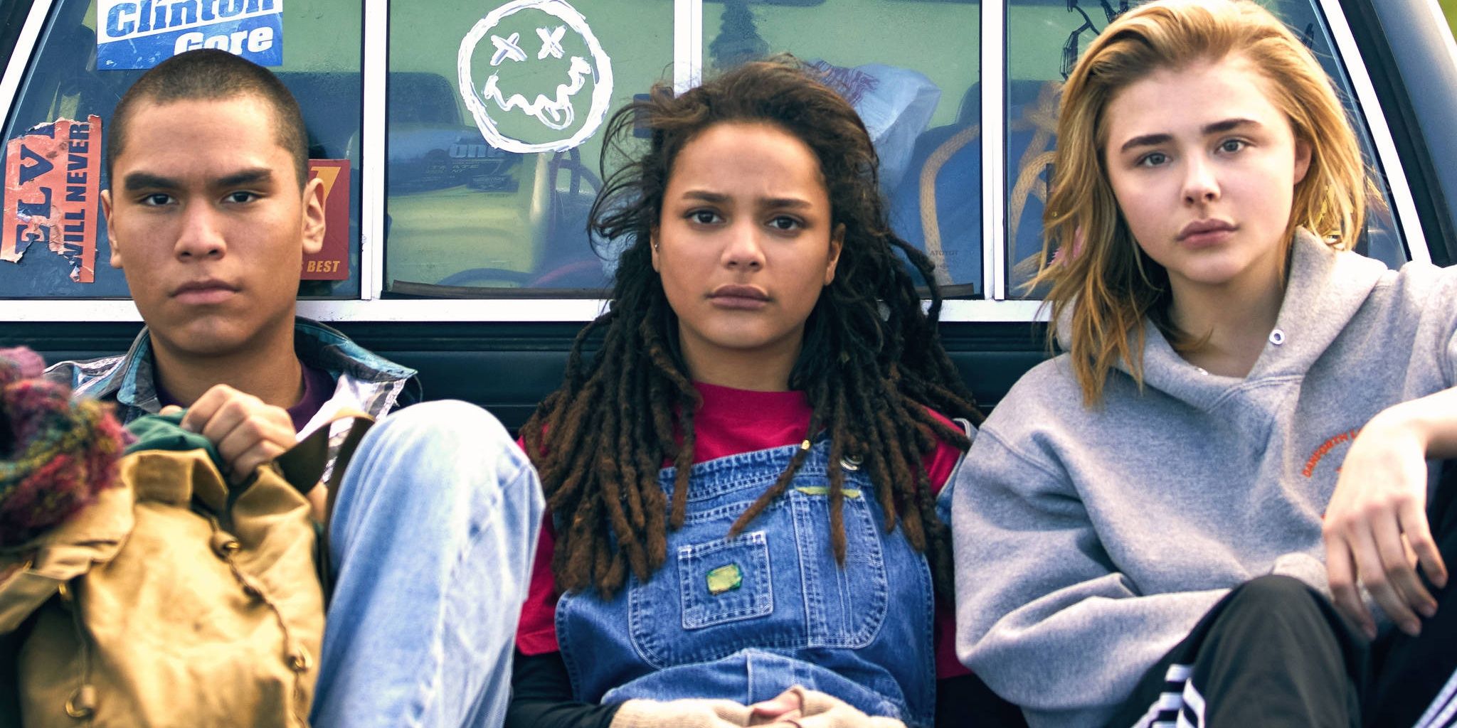 Adam, Cameron, and Jane sitting in the back of a truck in The Miseducation of Cameron Post