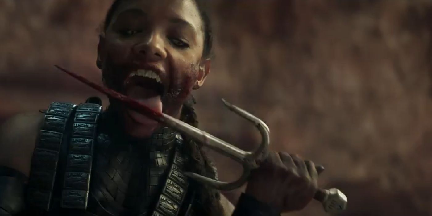 Milena licks her dagger in Mortal Kombat