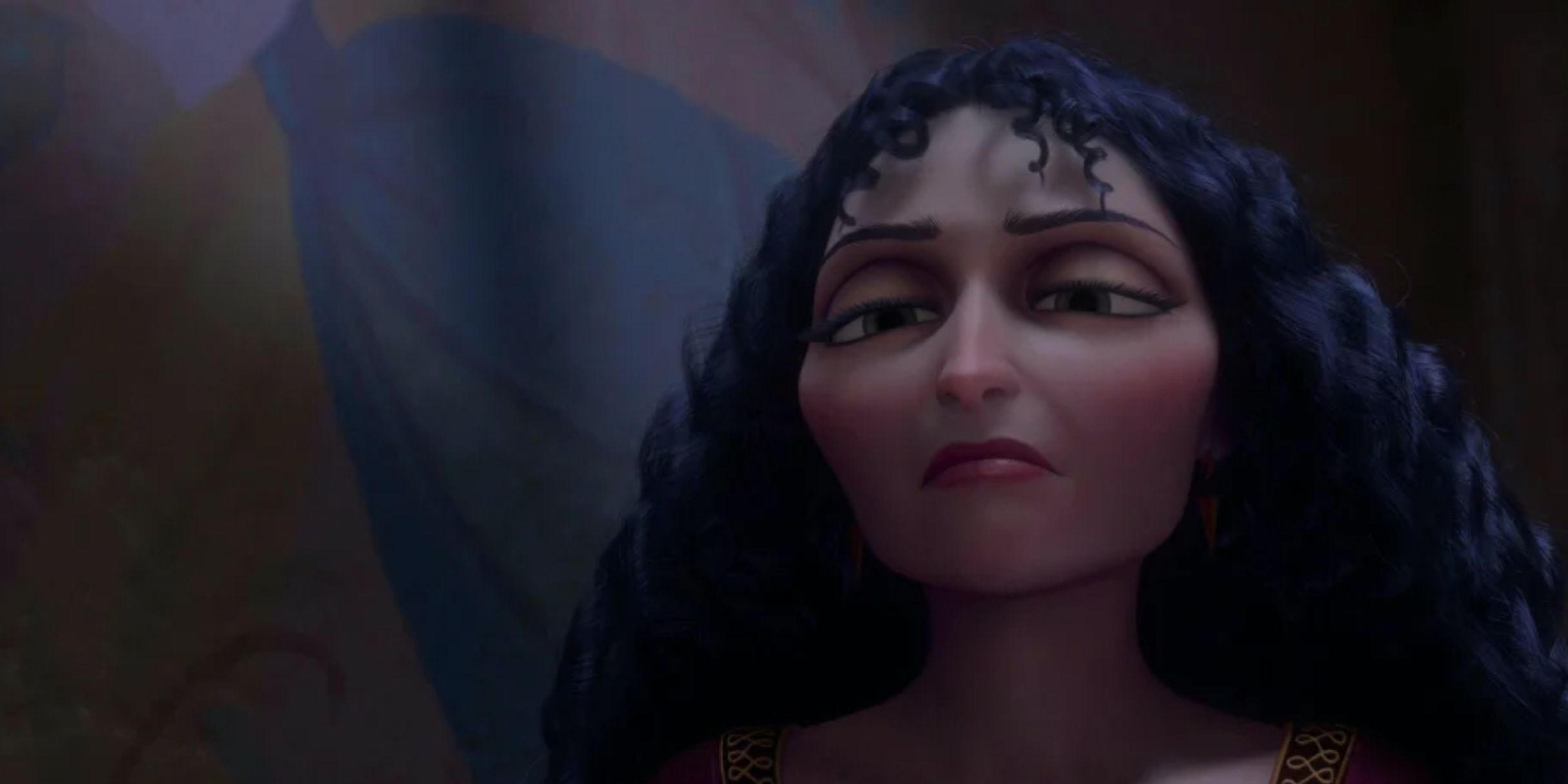 Mother Gothel looking like a villain in Tangled.