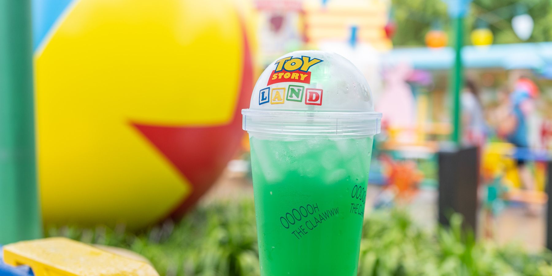 Green drink in front of a ball
