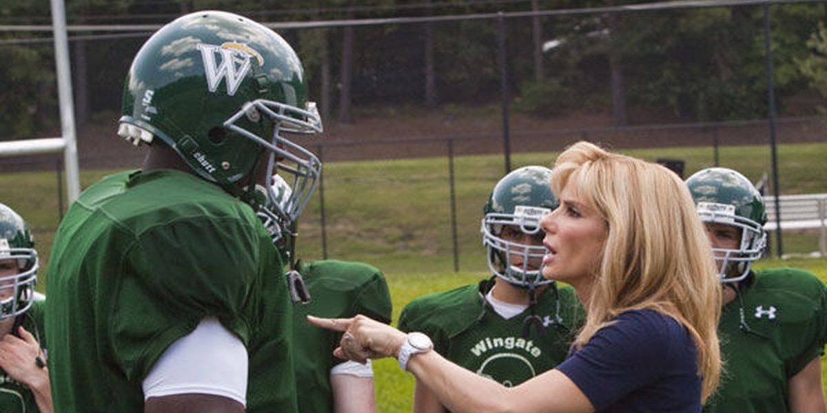 Michael Oher (Quinton Aaron) and Leigh Anne Tuohy (Sandra Bullock) in &quot;The Blind Side.&quot;