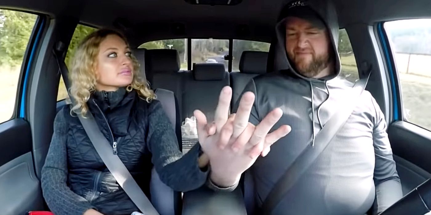 Natalie Mordovtseva in black sweater And Mike Youngquist in grey hoodie On 90 Day Fiancé in car