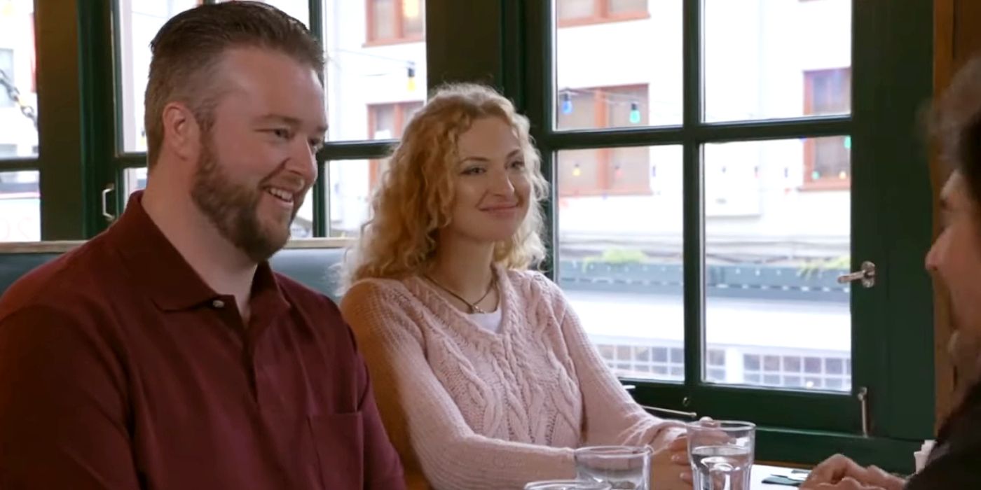 Natalie Mordovtseva And Mike Youngquist In 90 Day Fiancé smiling in restaurant
