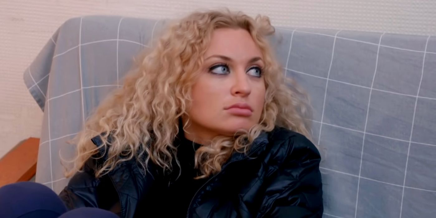 Natalie Mordovtseva sitting in a couch looking up In 90 Day Fiance 5