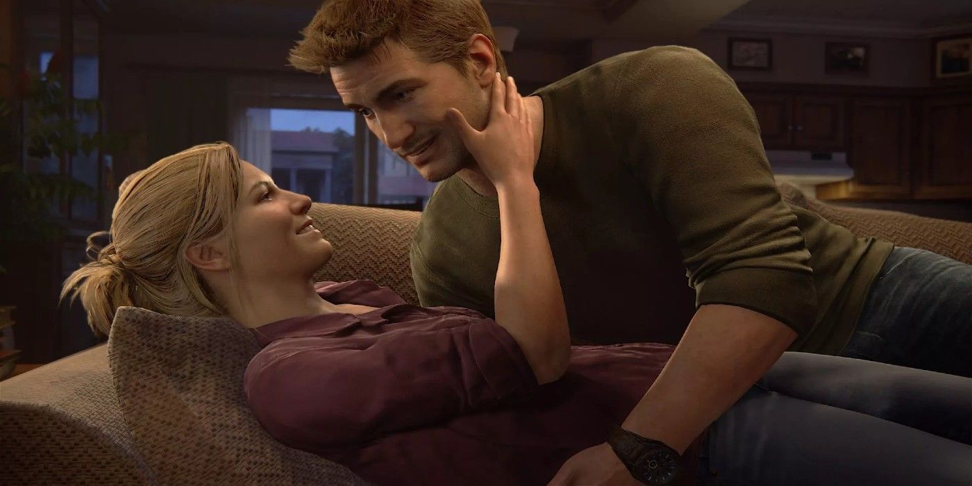 Nate and Elena cuddling on a couch in Uncharted 4.
