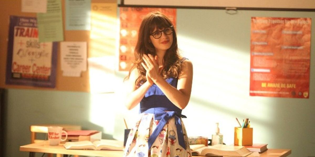 Jess stands at the front of her classroom in New Girl