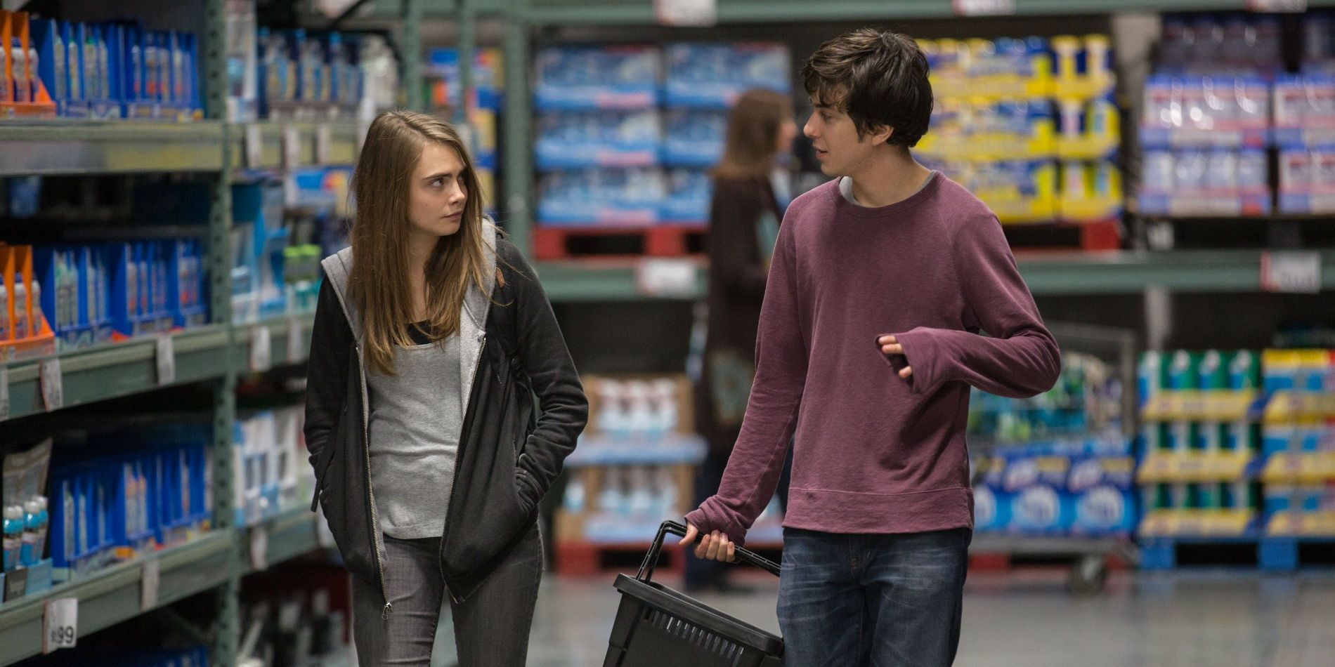 Margo (Cara Delevigne) &amp; Quentin (Nat Wolff) in a store together in Paper Towns