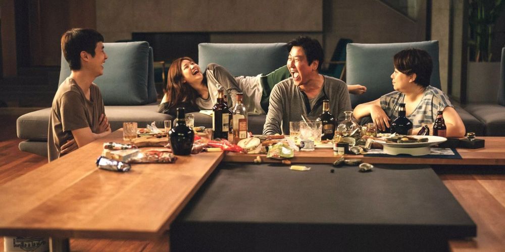 The Kim family eating and laughing together in Parasite
