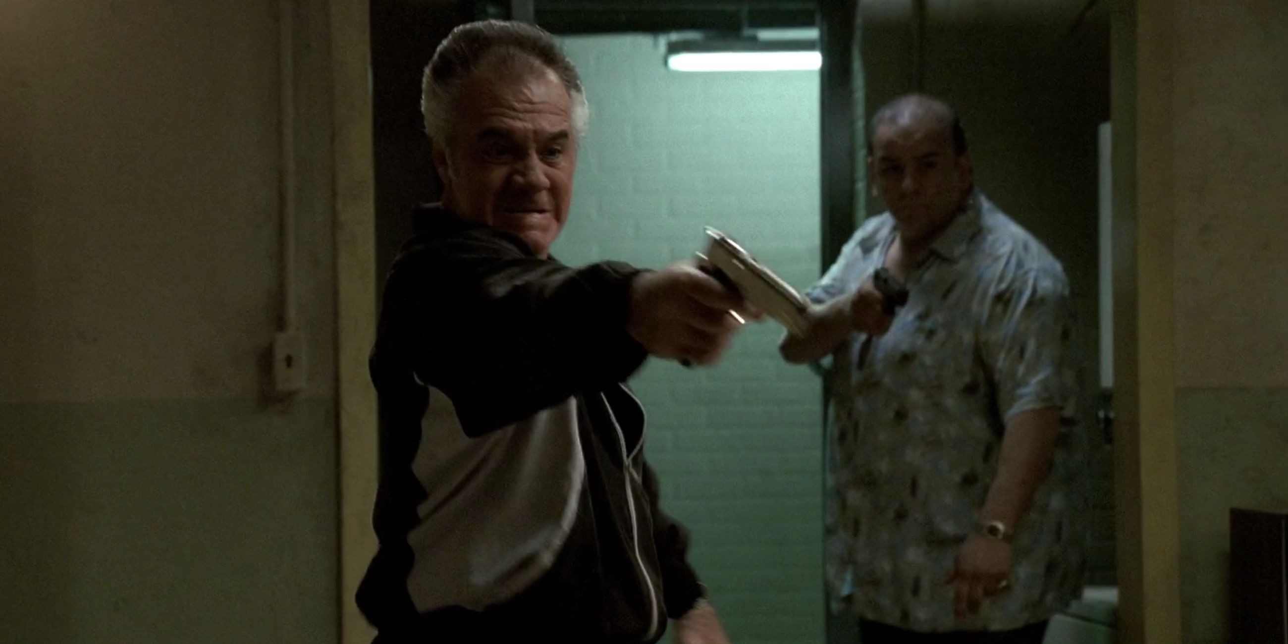 Paulie Walnuts shooting a gun in The Sopranos