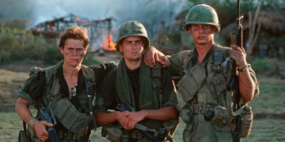Willem Dafoe, Charlie Sheen, and Tom Berenger in Platoon.