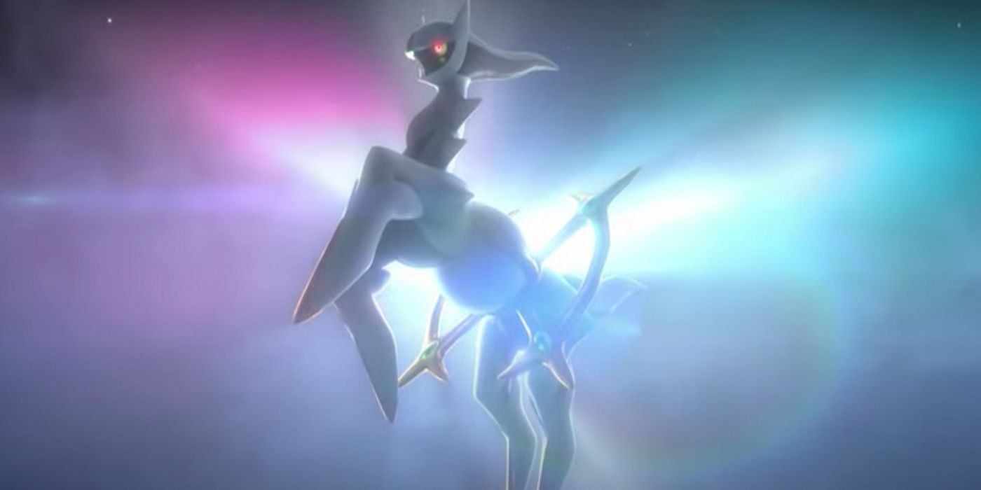 Arceus floating in a multicolored sky in the Pokémon anime.